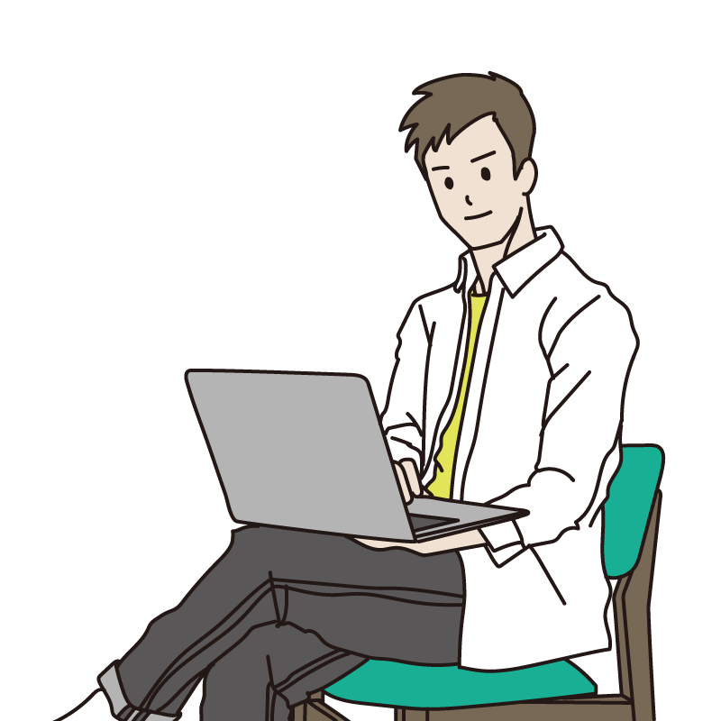 ノートパソコンを操作する男性（カラー）